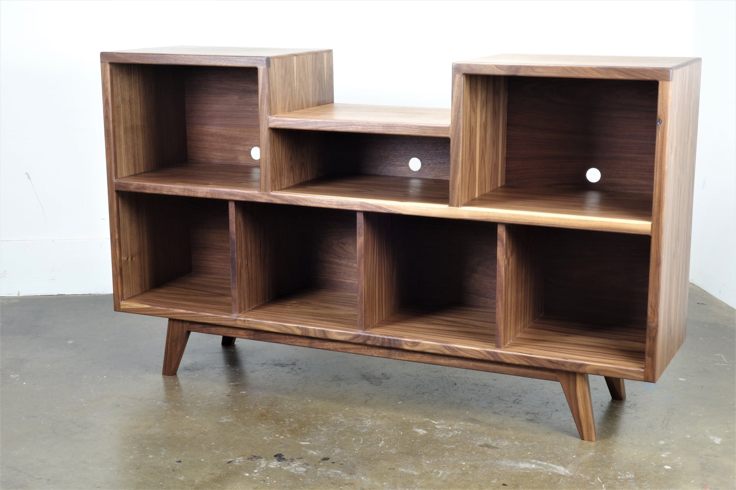 Interior view of the Cloud 9 credenza showing spacious compartments ideal for organizing vinyl records and audio equipment