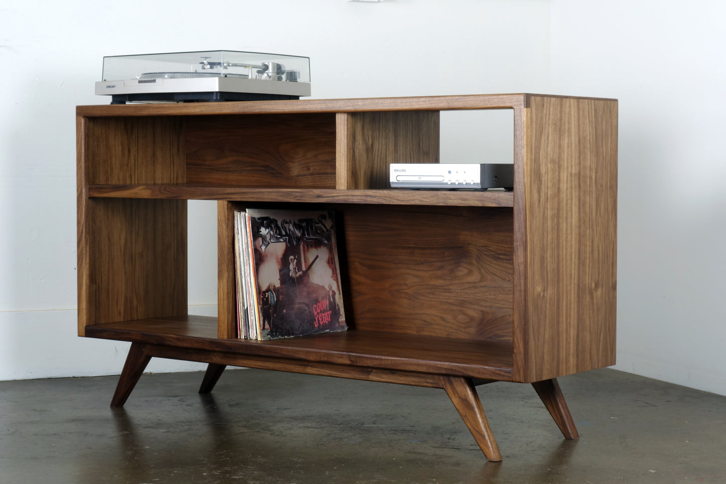 Front view of the A Bomb record storage console, handcrafted from walnut wood with a natural oil finish.