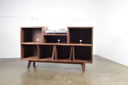 Front view of the Cloud 9 credenza, a handcrafted walnut piece in mid-century modern style with a built-in record player notch