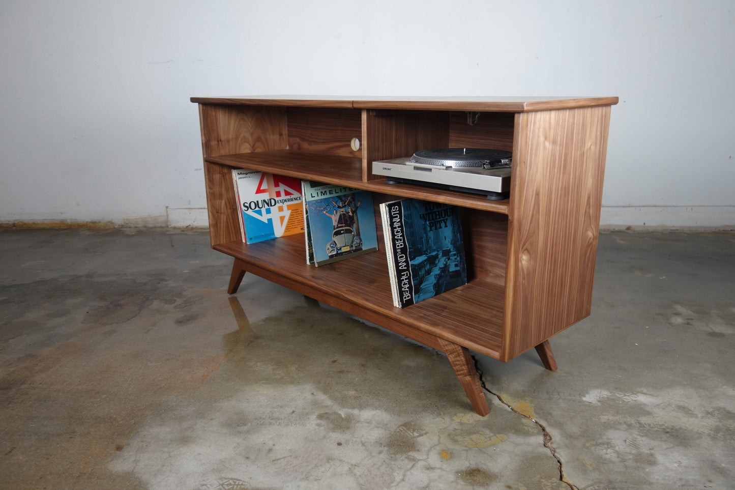 Side view of the Dyno credenza showcasing its elegant mid-century lines and solid walnut construction