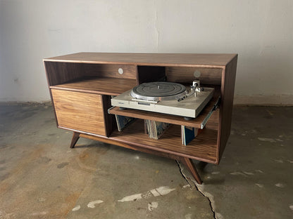 Front view of the EastSide Player credenza, designed for record collectors with a hinged door, pullout record player shelf, and record dividers