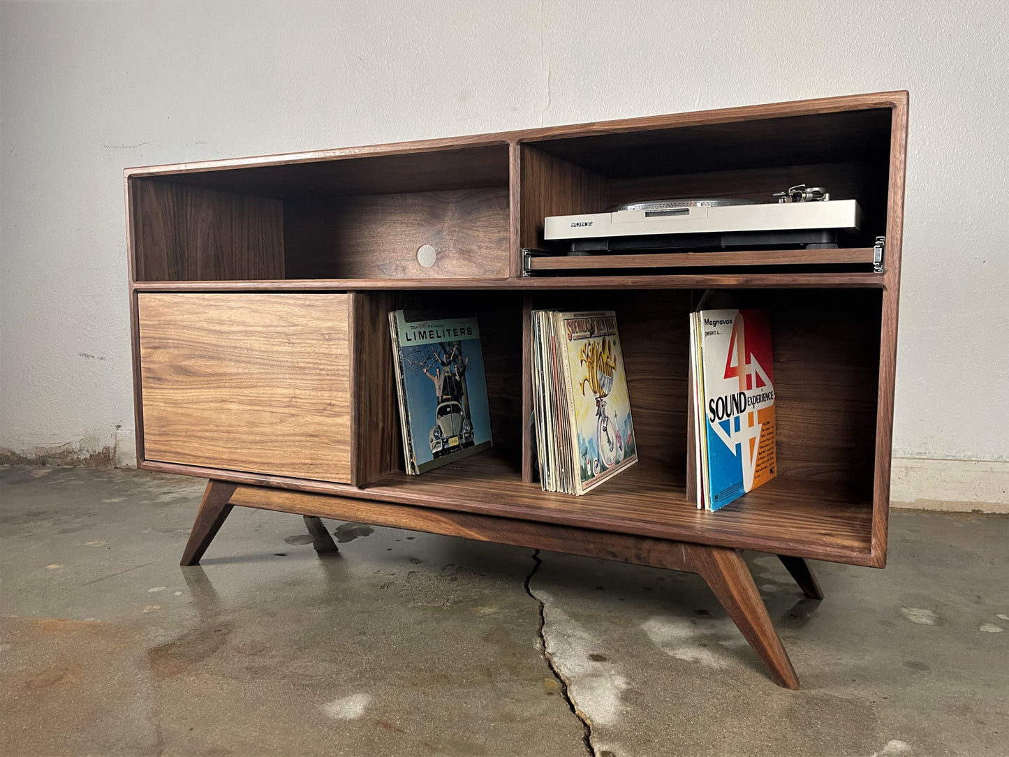 Side view of the EastSide Player credenza showcasing its handcrafted walnut construction and mid-century modern design