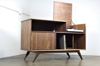 Close-up of the flip-up top on the Electric Koolaide credenza, designed for easy access to the record player compartment