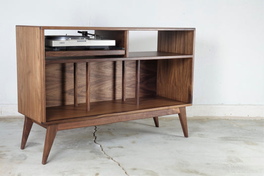 Side view of the Felx credenza highlighting its solid walnut construction, clean lines, and timeless mid-century modern style