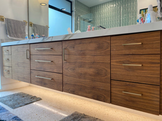 The floating double sink vanity styled in a modern bathroom, combining functional storage with elegant wood finishes