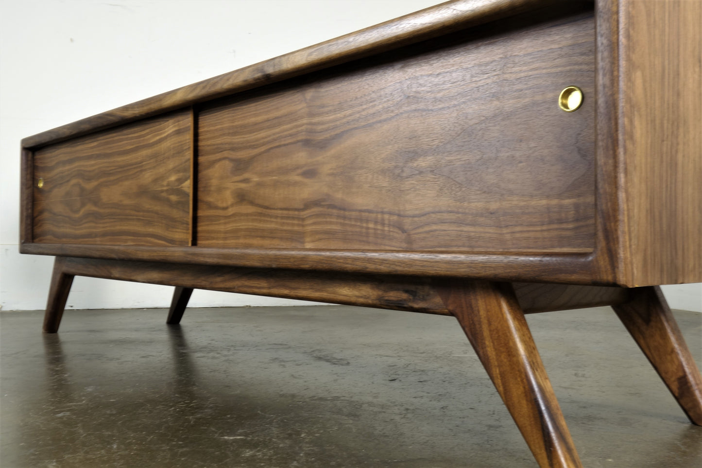 Side view of the G2 console showcasing its minimalist mid-century modern design and hand-applied natural oil and wax finish