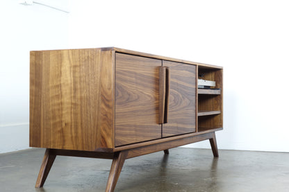 Close-up of the natural walnut wood grain on the GoldenGirl credenza, highlighting its unique patterns and hand-applied oil and wax finish