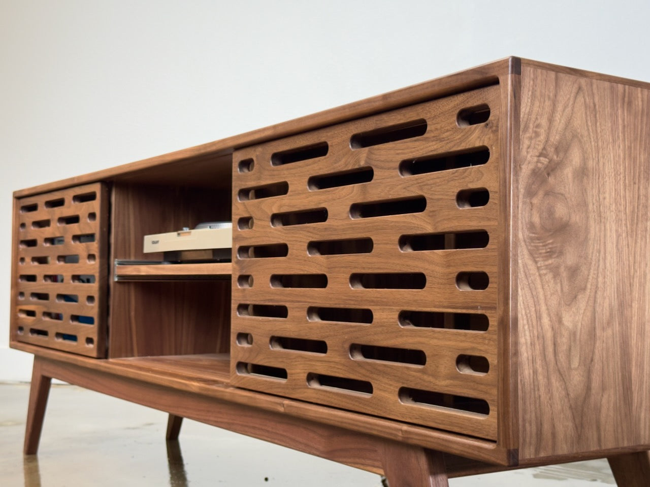 Greyboy walnut console close up wood grain detail