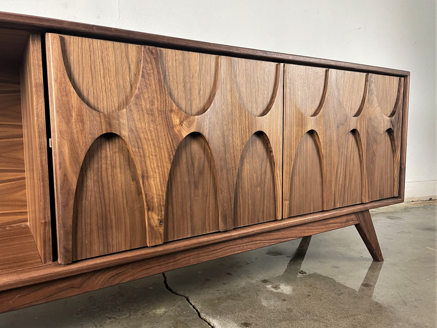 Side view of the Bagel credenza built with traditional and modern techniques in solid walnut for timeless heirloom quality