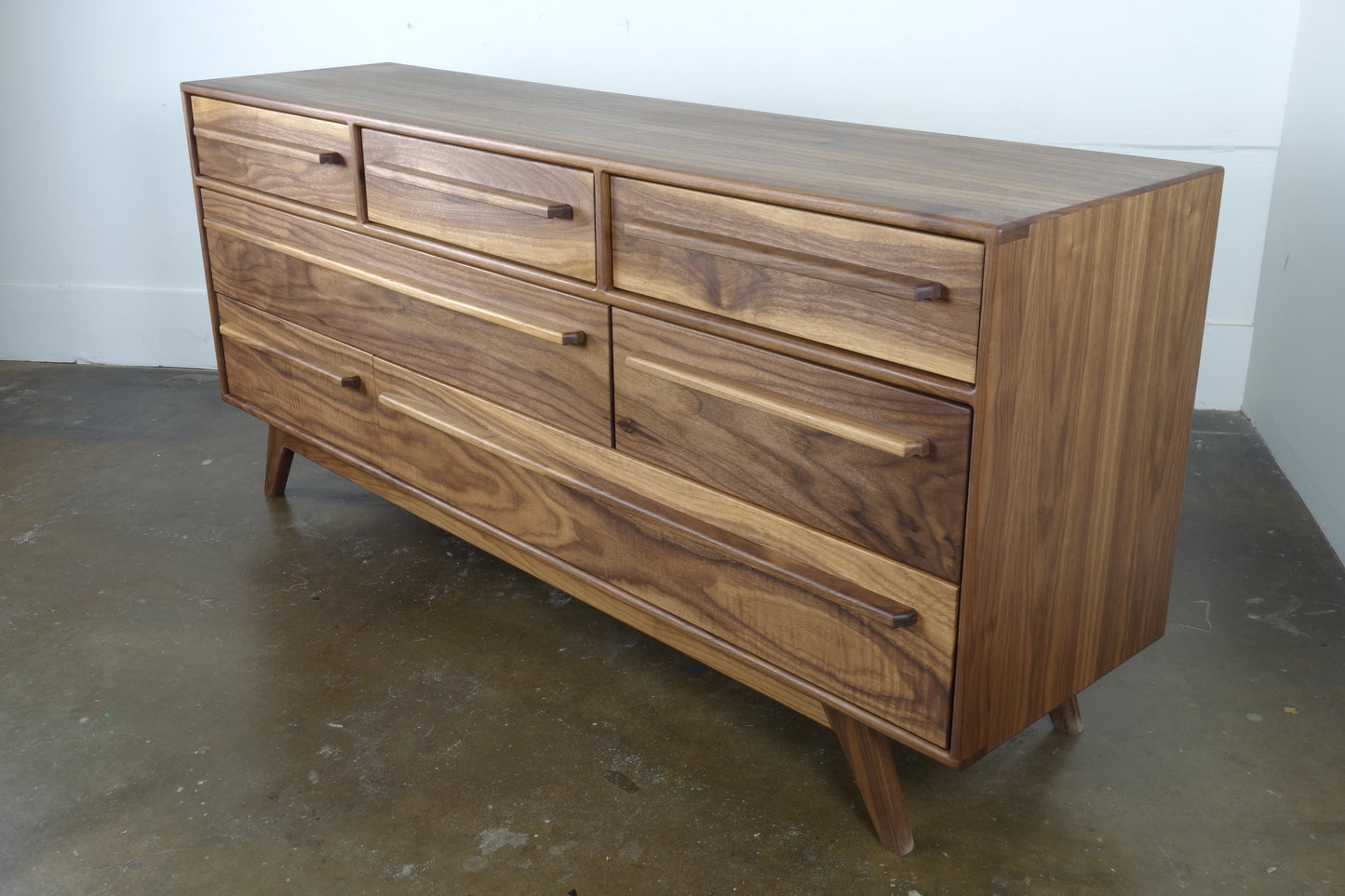 Side view of the JellyBean dresser showcasing its clean lines, solid walnut construction, and timeless craftsmanship