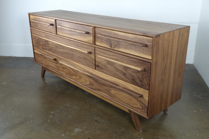 Side view of the JellyBean dresser showcasing its clean lines, solid walnut construction, and timeless craftsmanship