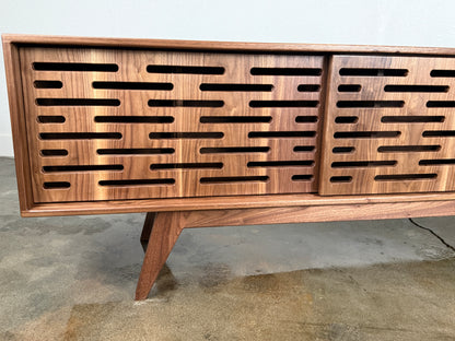 Mid century modern walnut credenza handcrafted from premium hardwood and veneer.
