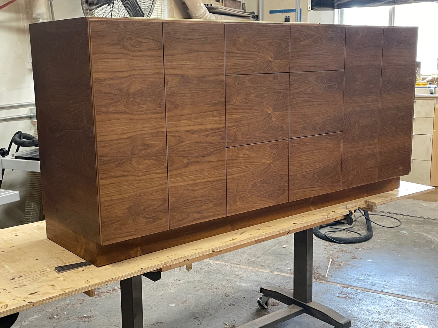 Detailed view of the wood grain on the mid-century modern bathroom vanity, available in walnut, white oak, mahogany, and cherry finishes