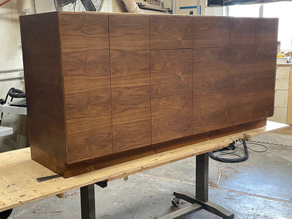 Detailed view of the wood grain on the mid-century modern bathroom vanity, available in walnut, white oak, mahogany, and cherry finishes