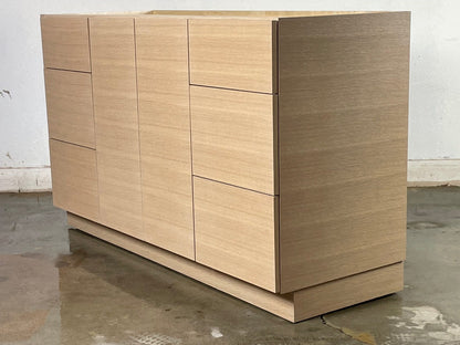 Close-up of the vanity’s drawer bank, showcasing undermount self-closing slides and prefinished maple or birch interior