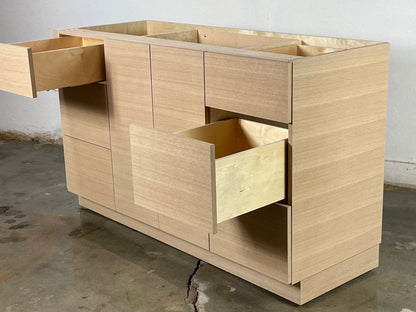 Detailed view of the wood veneer finish on the single sink vanity, available in walnut, teak, mahogany, cherry, and white oak