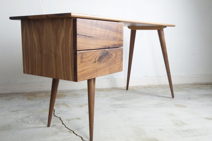 Side view of the SnowCone desk showcasing its clean lines, minimalist design, and heirloom-quality craftsmanship