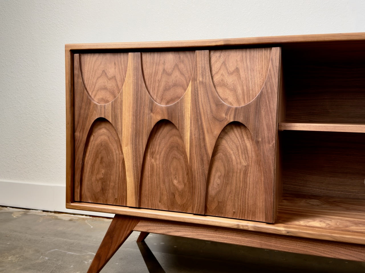 Walnut Brasilia door credenza sculpted wood detail mid century modern