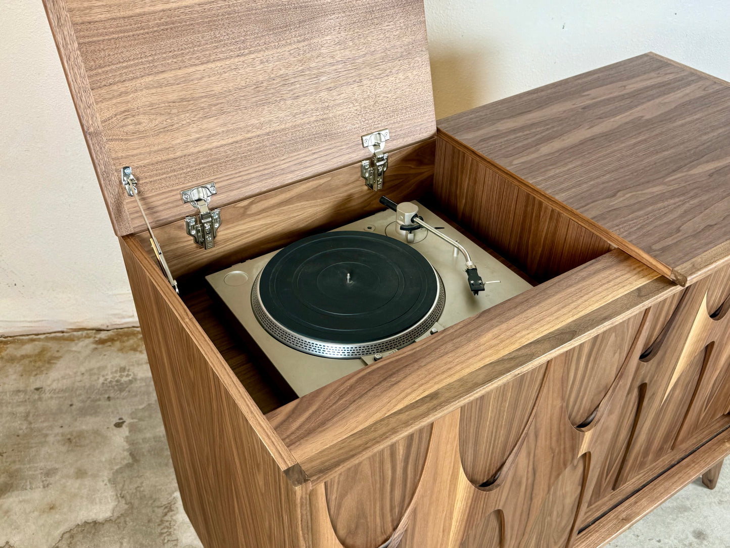 Walnut record player console flip top lid open showing turntable mid century modern