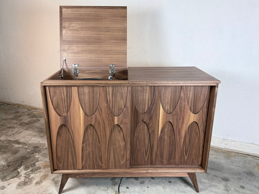 Walnut flip top record player console with Brasilia style sculpted doors mid century modern