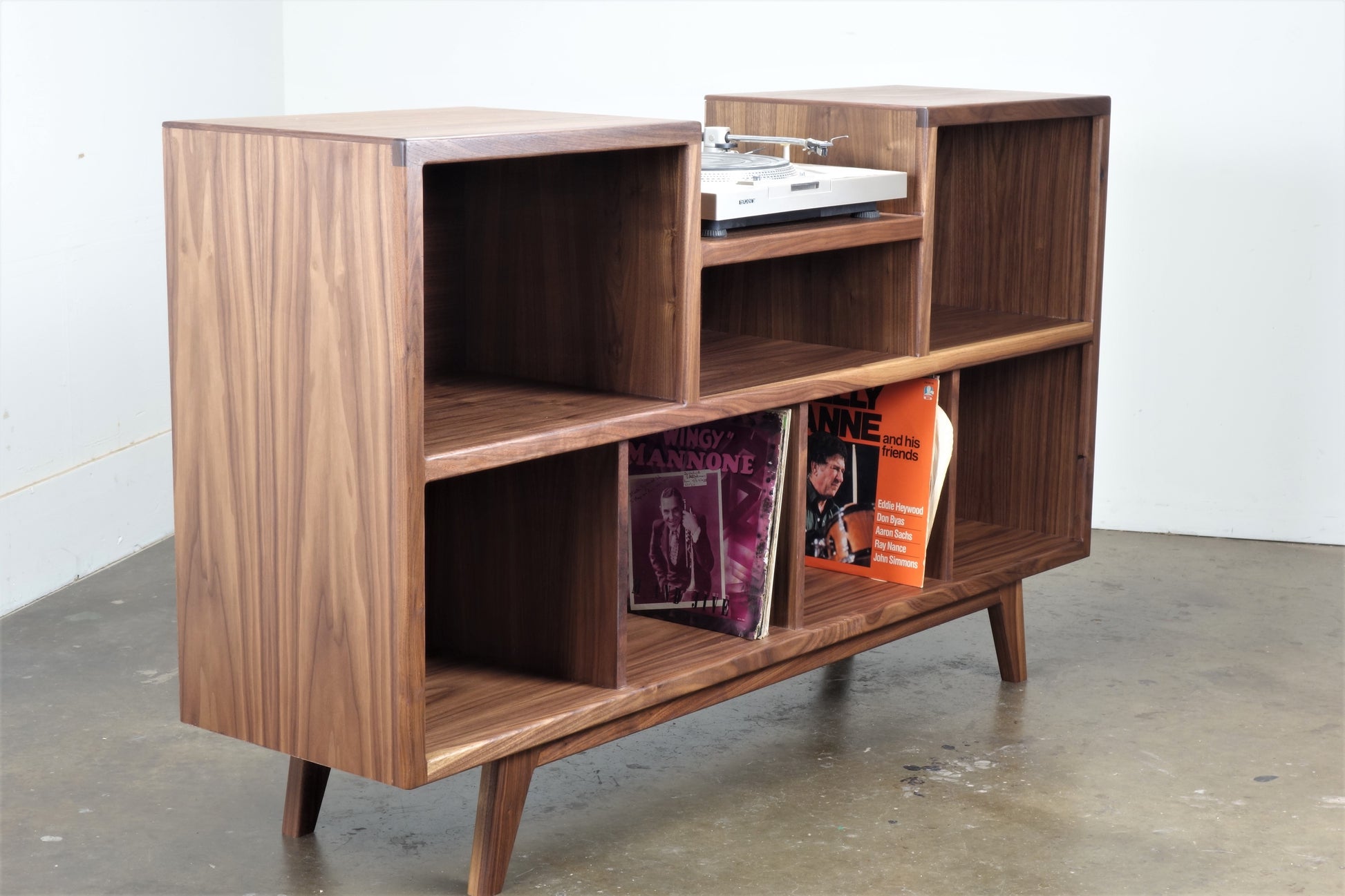 Walnut record player console with curved design mid century modern
