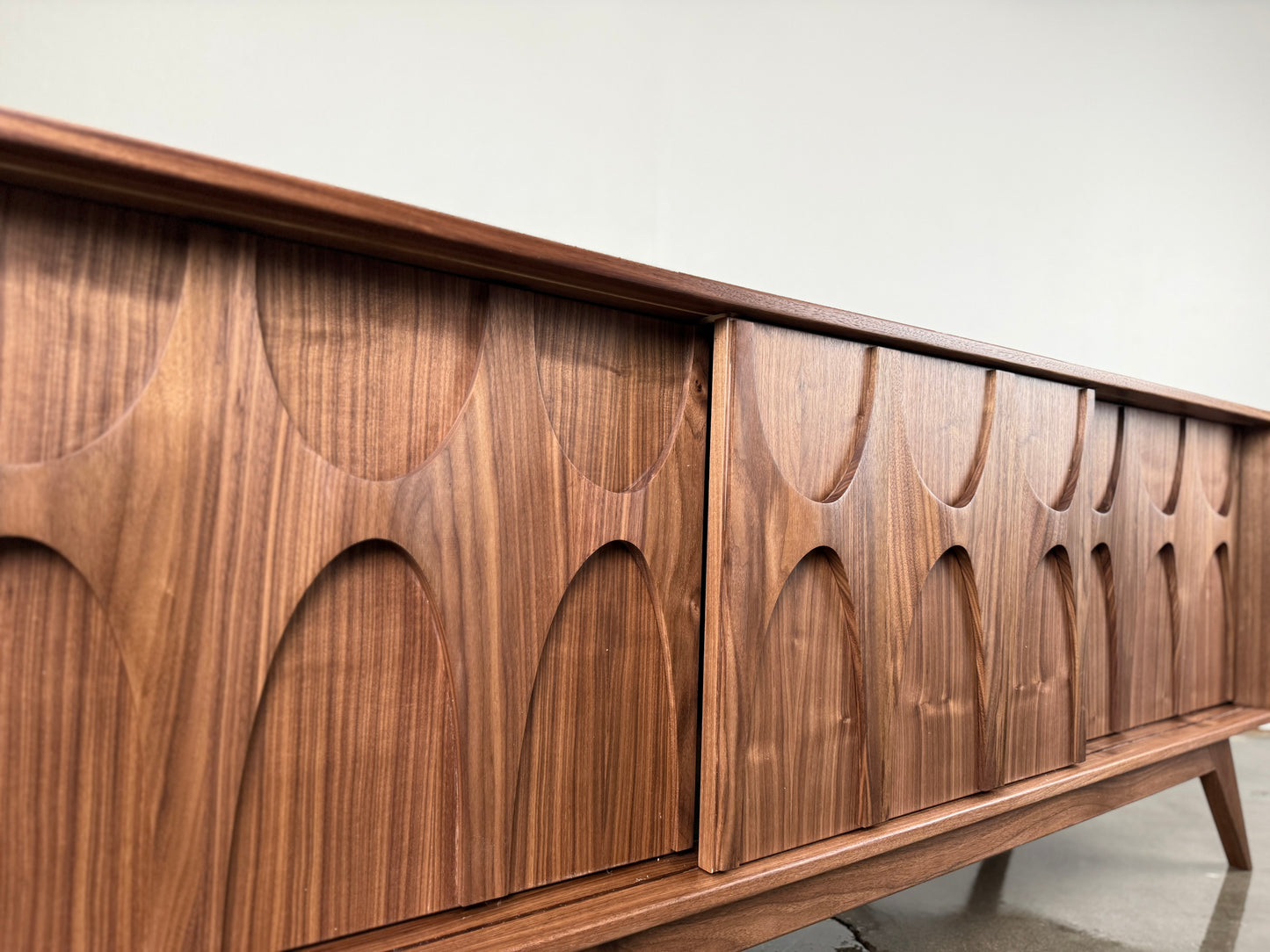 Walnut Stella J console door detail sculpted wood pattern mid century modern