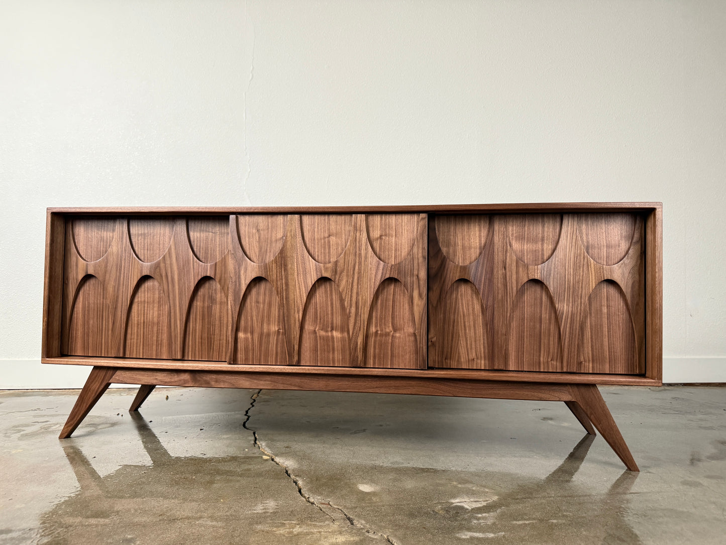 Walnut Stella J console front view with sculpted door fronts mid century modern
