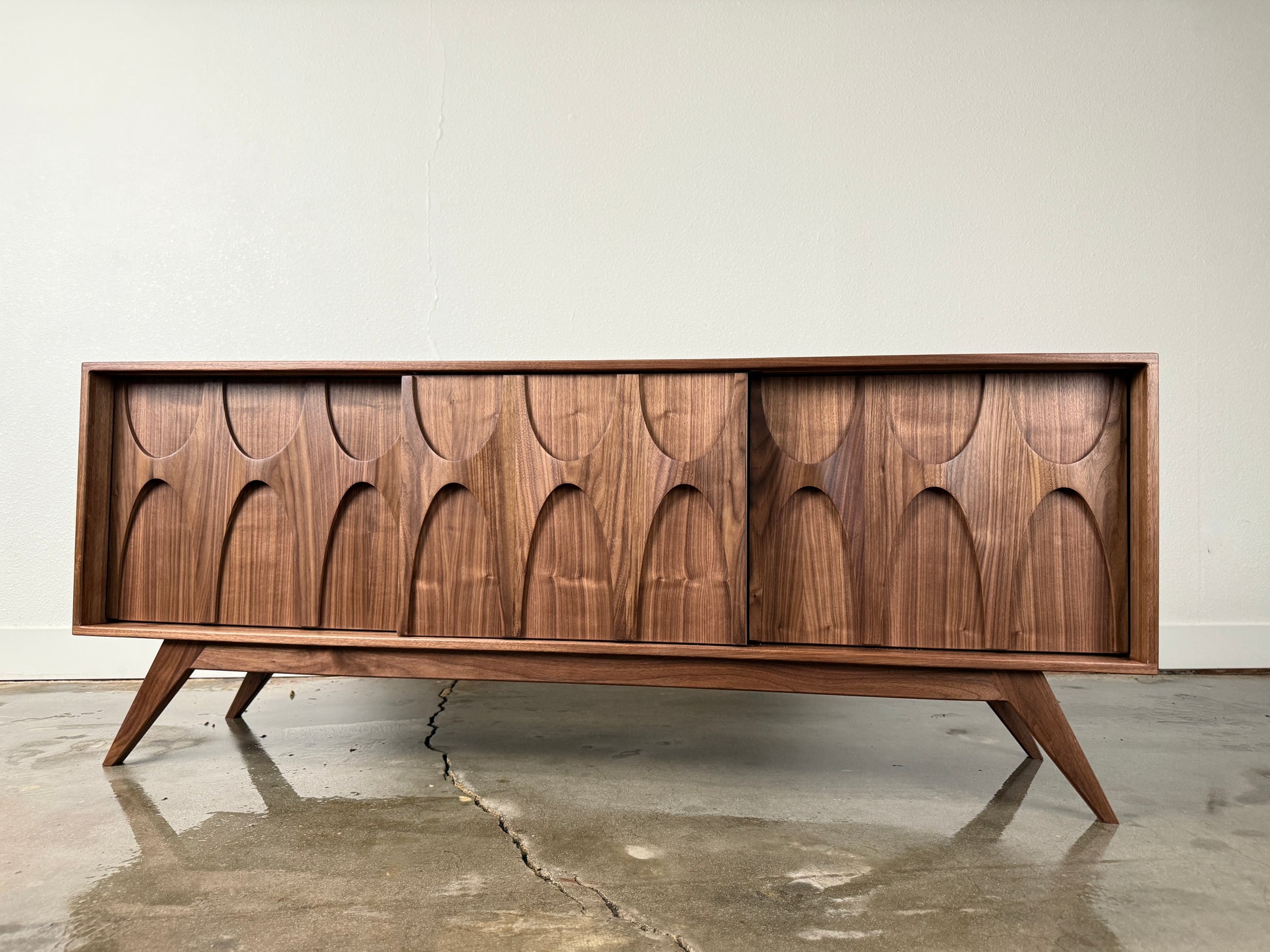 Walnut Stella J console front view with sculpted door fronts mid century modern